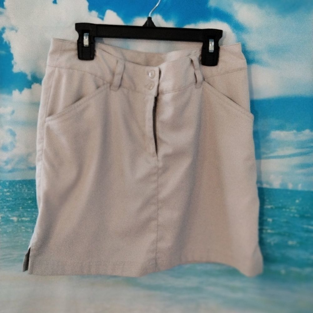 Callaway woman's cream color skirts: pre-owned.